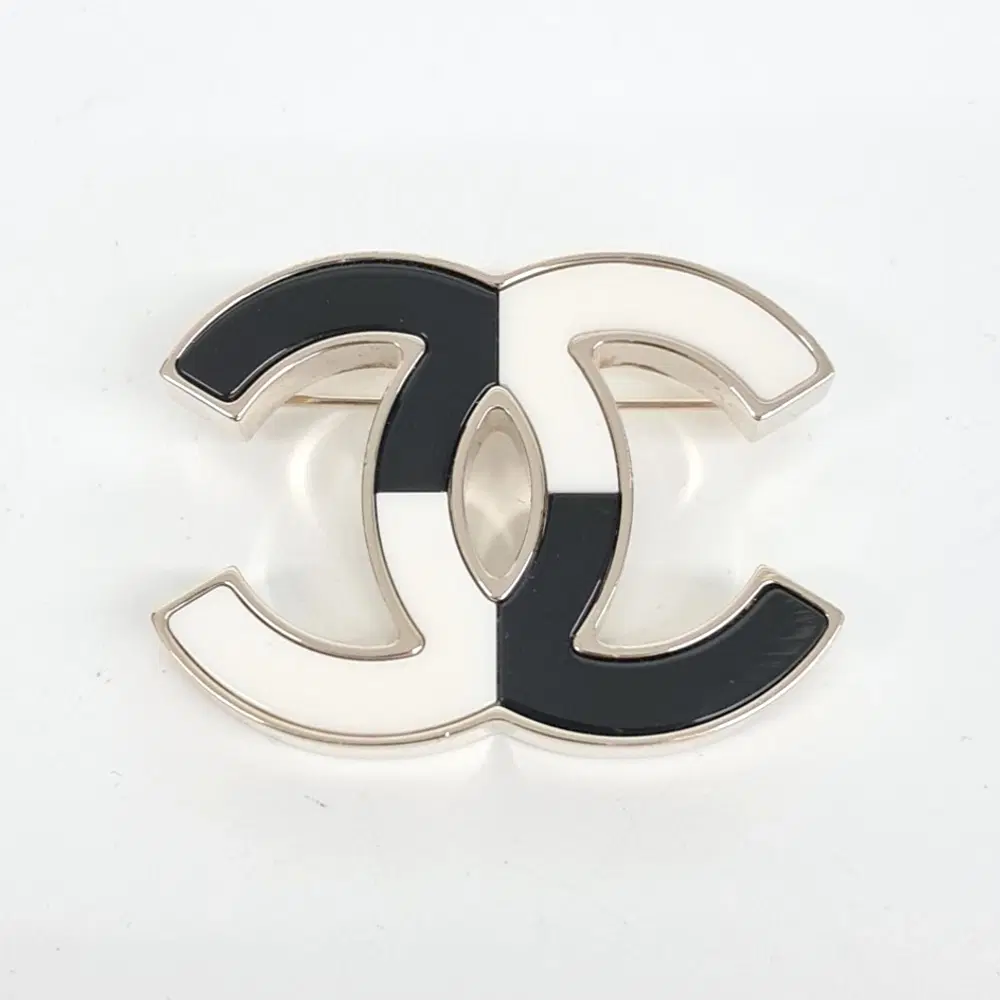 Chanel logo brooch