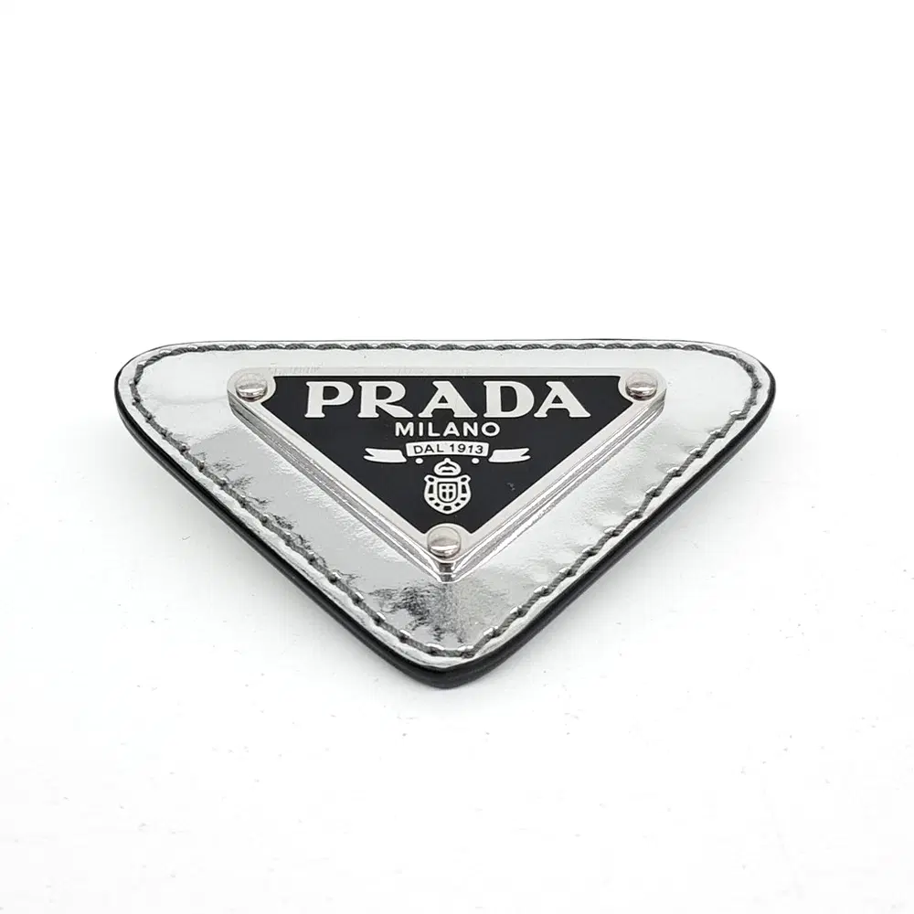 Prada triangle logo brooch