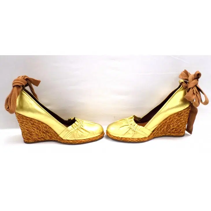 BCBGMaxAzria Golden Wedges