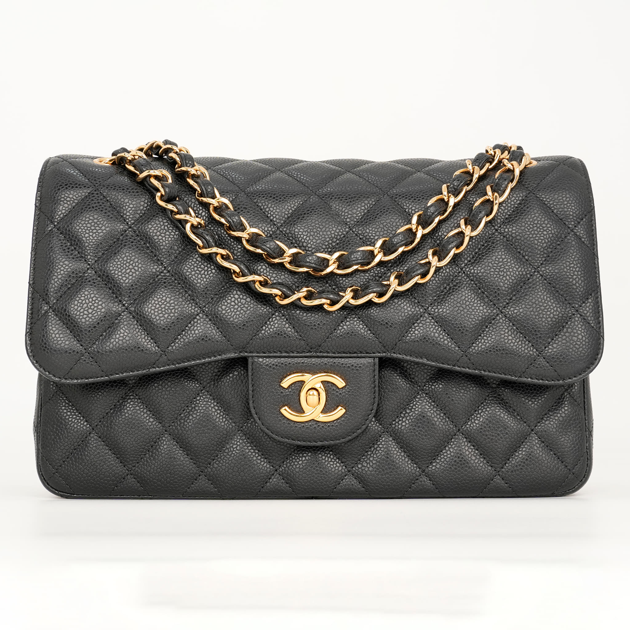 Chanel Jumbo Classic Flap Bag in black caviar leather with gold-tone hardware