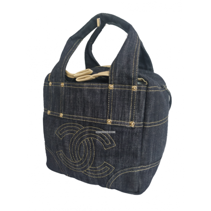 Authentic Chanel Blue Solid Denim Bag on sale at JHROP. Luxury Designer  Consignment Resale @jhrop_official