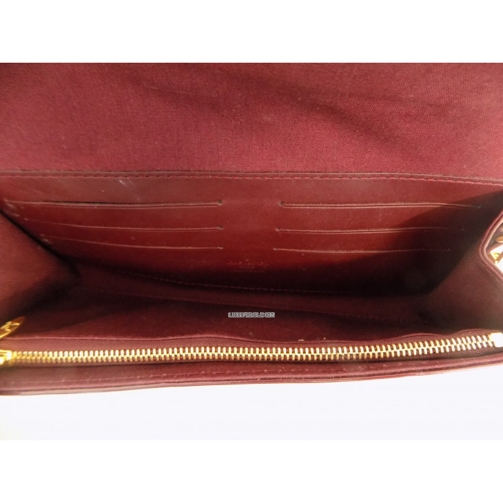Sunset boulevard patent leather clutch bag Louis Vuitton Brown in