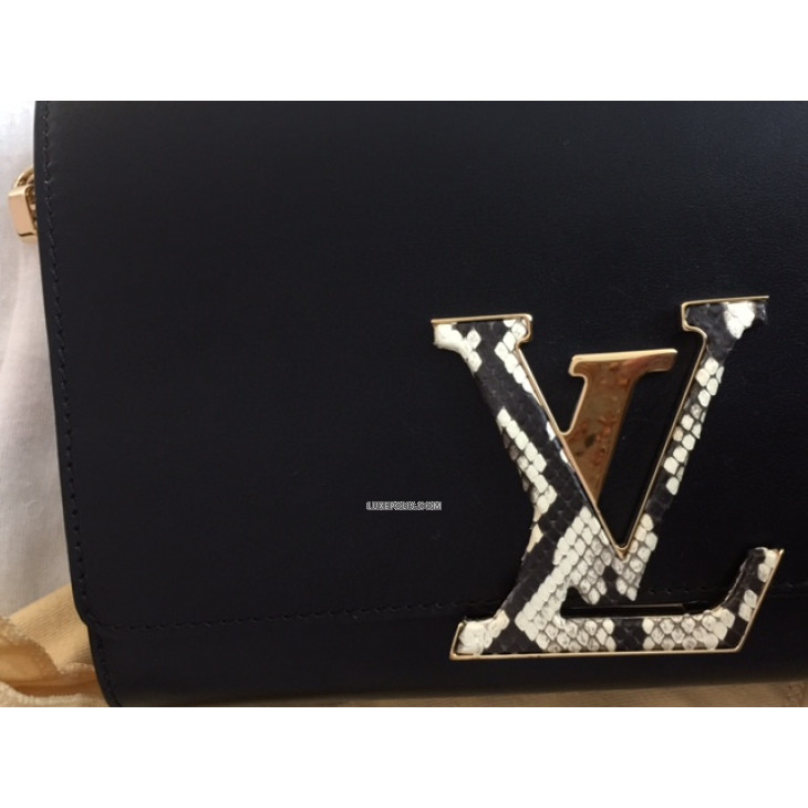 Louis Vuitton Louise Leather Handbag