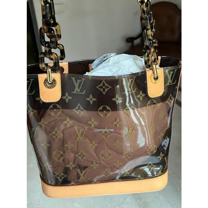 Buy Pre-owned & Brand new Luxury Louis Vuitton Limited Edition Vinyl Monogram  Ambre PM Bag Online