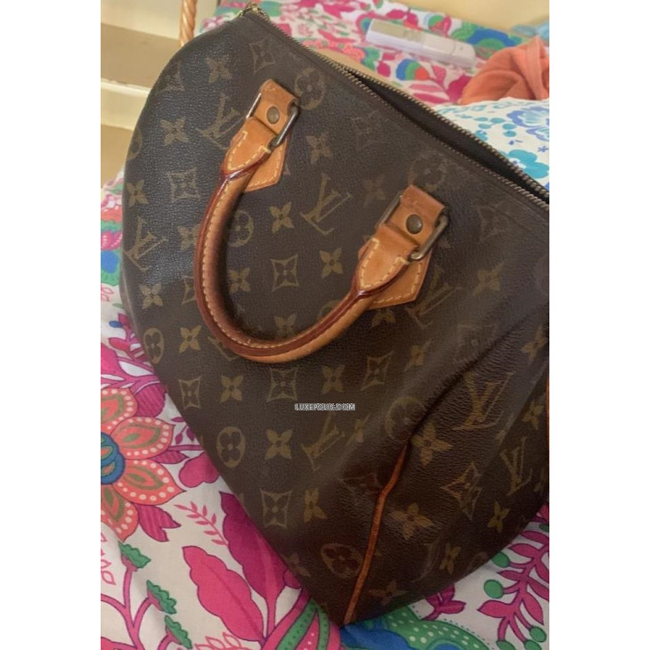 Buy Pre-owned & Brand new Luxury Louis Vuitton Monogram Canvas Speedy 25 Bag  Online
