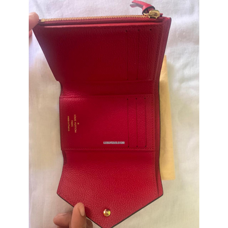 Authentic Louis Vuitton Red Monogram Empreinte Leather Victorine Walle –  Paris Station Shop