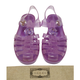 Gucci GG Logo Embossed Jelly Flat Sandals