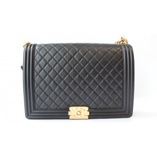 Chanel Large Boy Quilted Flap Bag, Black Caviar Leather, Goldtone Hardware | Luxepolis.com 