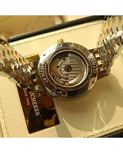 CARL F. BUCHERER Adamavi