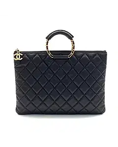 Chanel caviar loop clutch