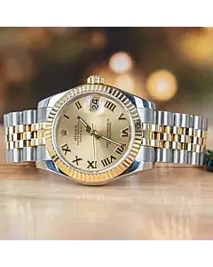 Rolex Datejust 31 MM Oystersteel and Yellow Gold with Champagne Roman Dial