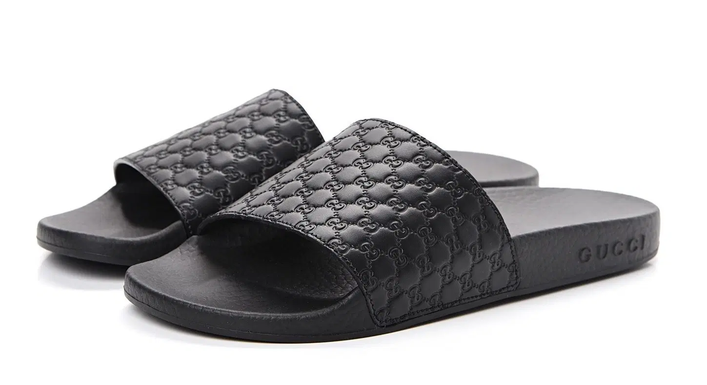 Gucci Black Microguccissima Logo Leather Slides