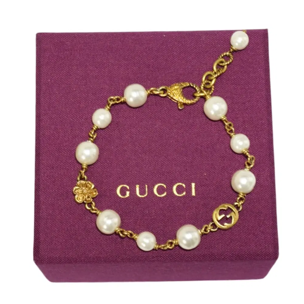 Gucci Interlocking G Gold Plated Flower Motif Faux Pearl Bracelet