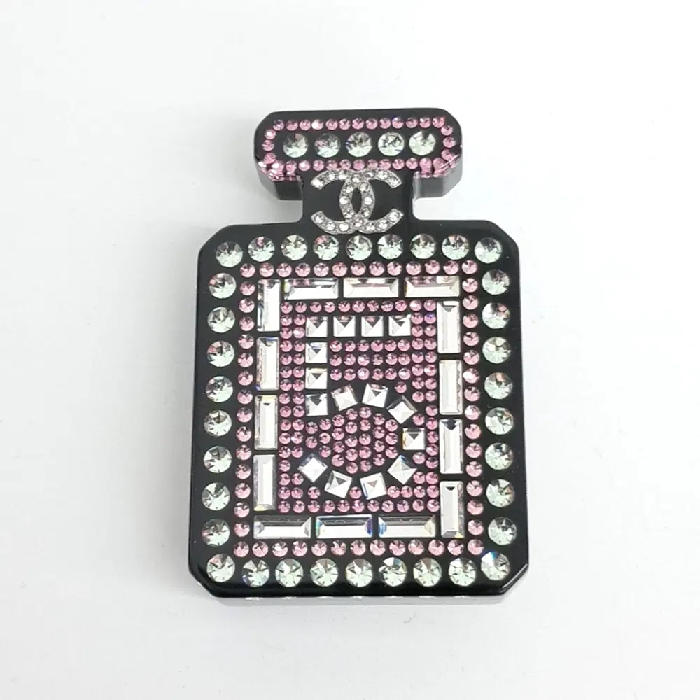 Chanel No. 5 brooch