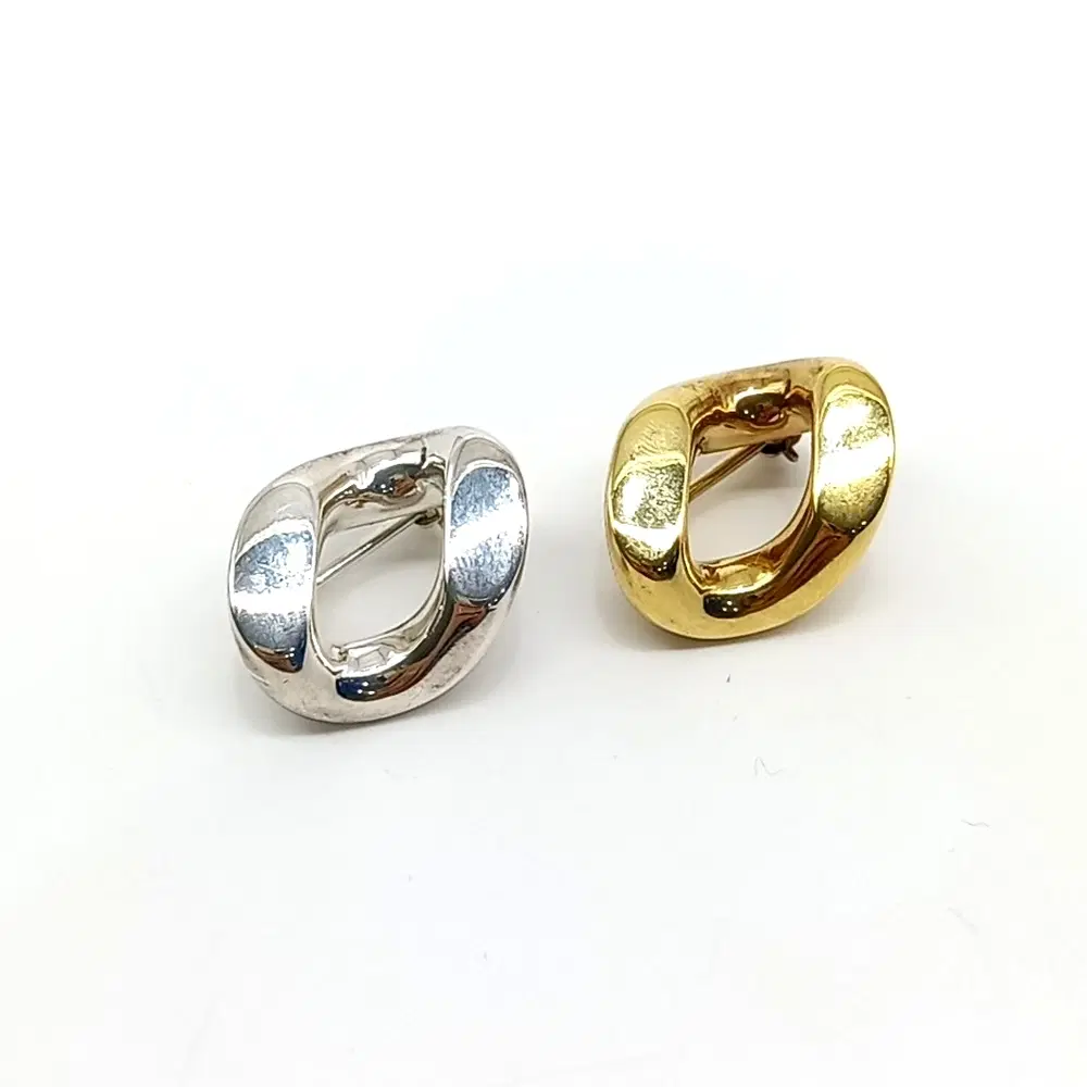 Bottega Veneta brooch set