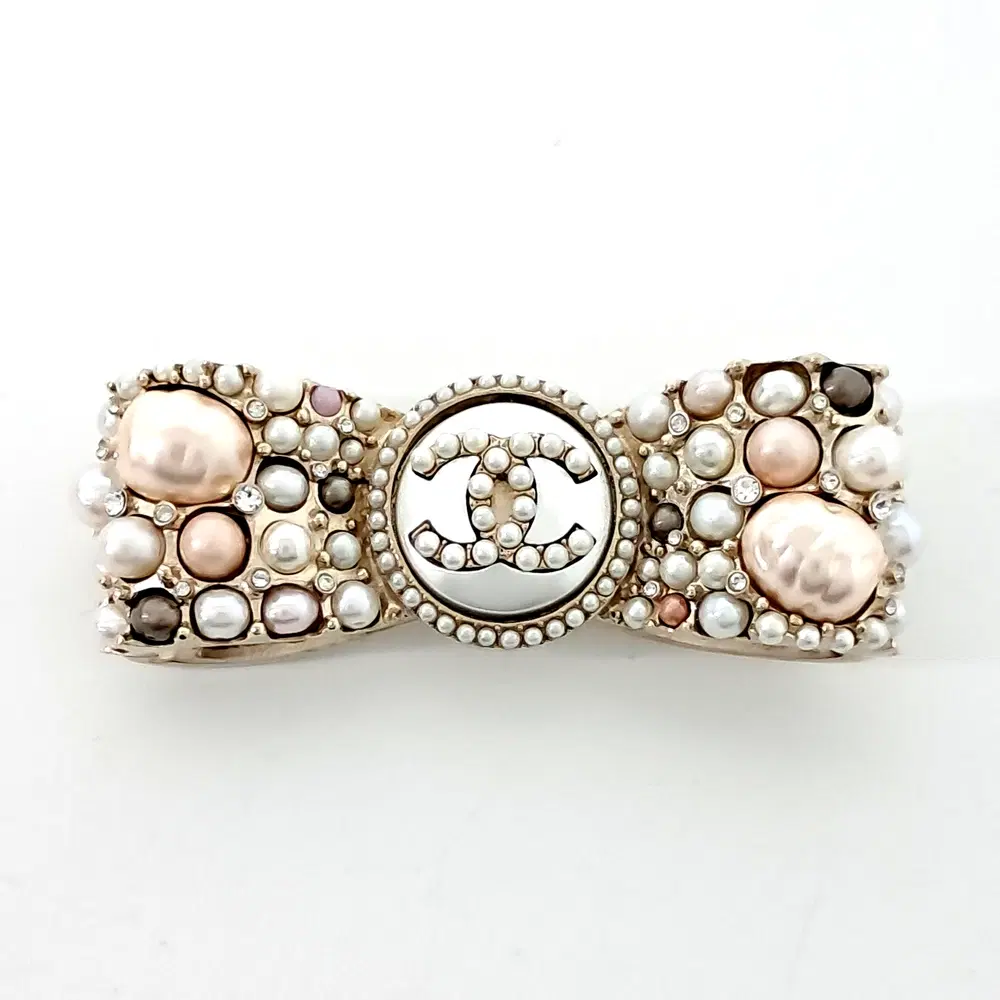 Chanel ribbon brooch