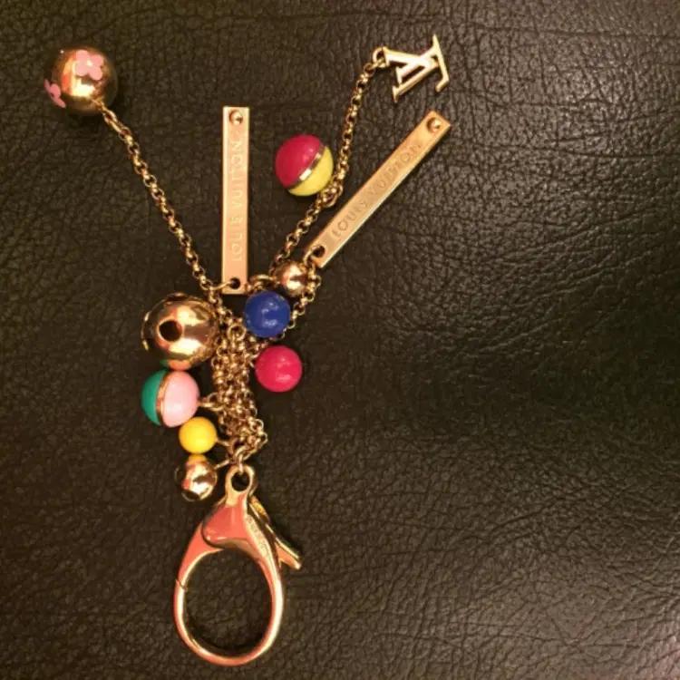 Louis Vuitton Gold-tone Mini Lin Croisette LV logo monogram keychain-Hover-Image