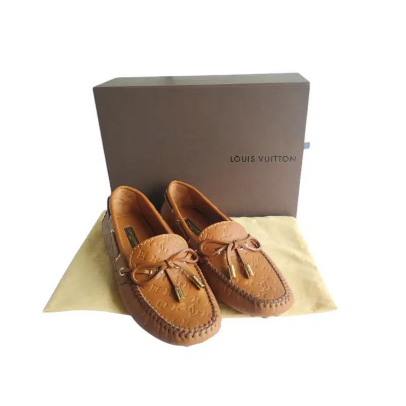 Louis Vuitton Gloria Monogram Embossed Leather Flat Loafers