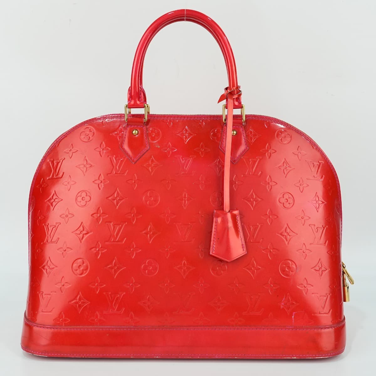 Louis Vuitton Alma handbag in red Monogram Vernis patent leather