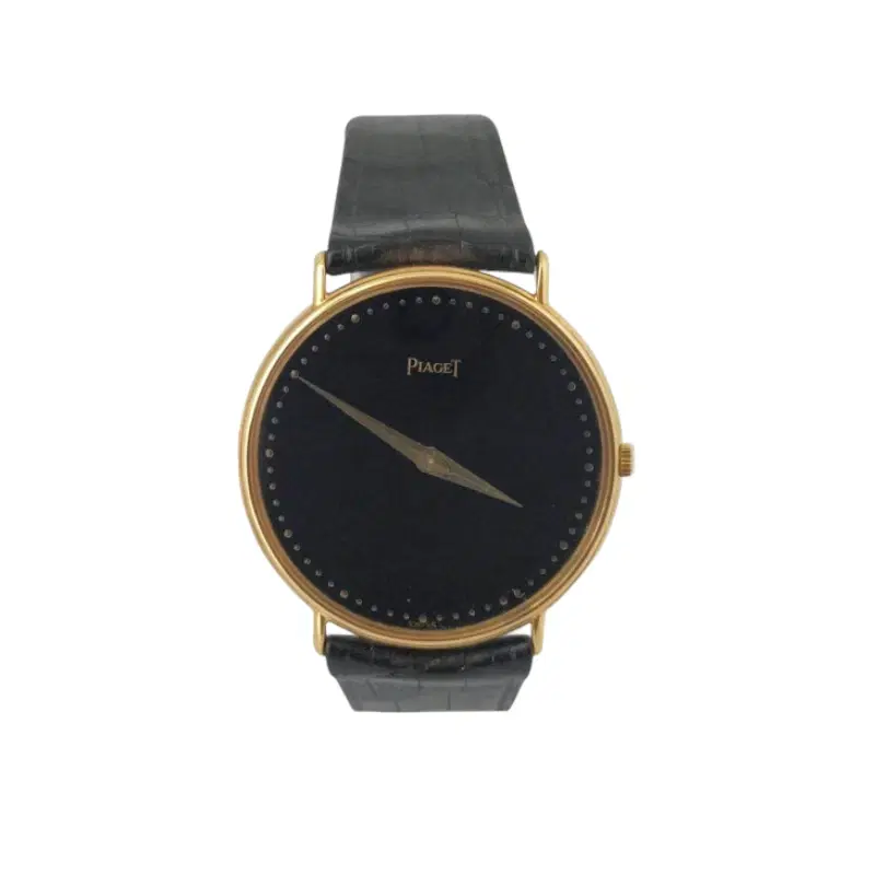 PIAGET VINTAGE BLACK SLIM 18K GOLD WATCH