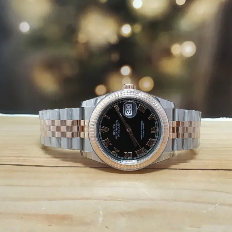 Rolex Datejust 36 Steel and Gold Black Roman Dial Jubilee