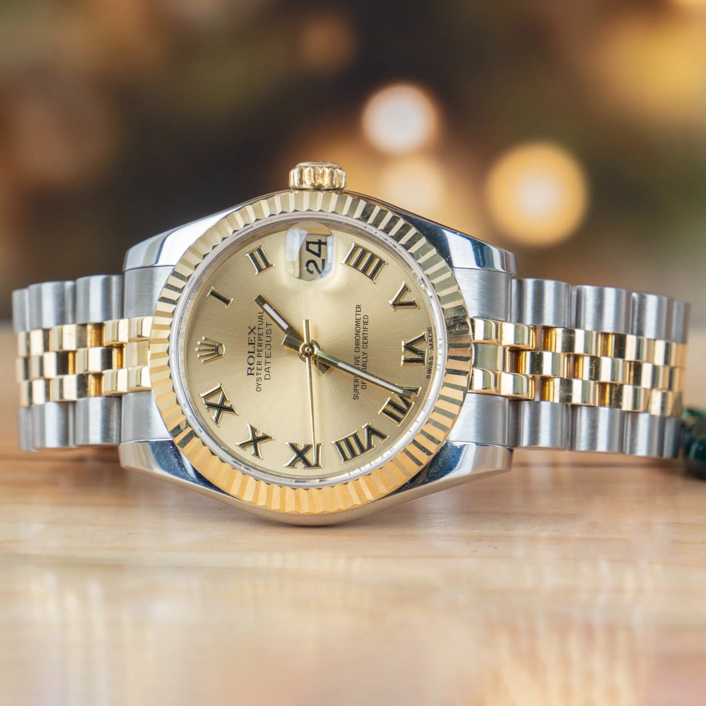 Rolex Datejust 31 MM Oystersteel and Yellow Gold with Champagne Roman Dial