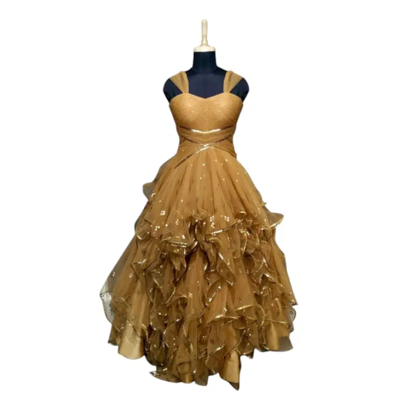 Shantanu and Nikhil Gold Gown